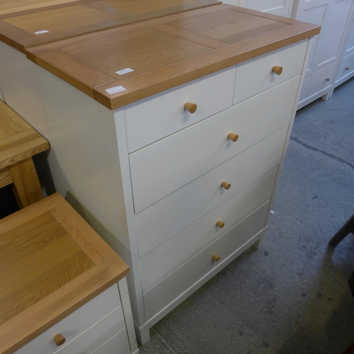 1628 - An oak and cream chest of six drawers * this lot is subject to VAT