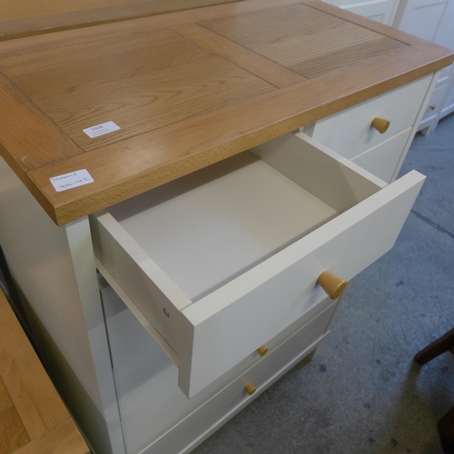 1628 - An oak and cream chest of six drawers * this lot is subject to VAT