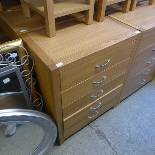 1657 - An oak five drawer chest * this lot is subject to VAT