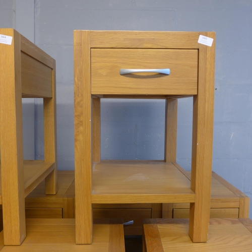 1665 - A pair of oak bedside tables * this lot is subject to VAT