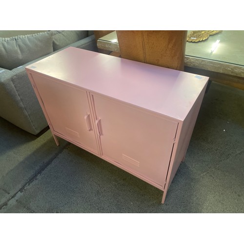 1675 - A pink two door metal locker