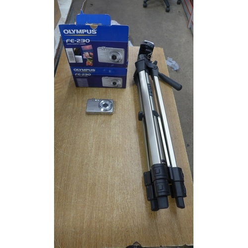 2135 - An Olympus FE-230 compact digital camera and a Star 42 camera tripod stand