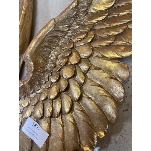 1677 - A pair of gold ornamental wings