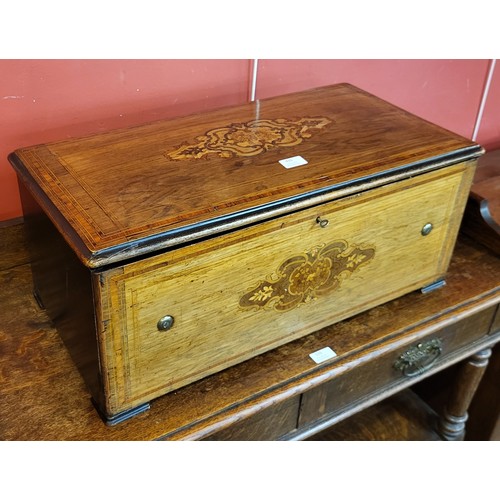 435 - A 19th Century Swiss inlaid rosewood 10-air music box