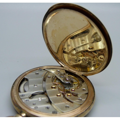 1063 - A 9ct gold full-hunter pocket watch, inner case 9ct gold, bears inscription dated 1928 and monogram,... 