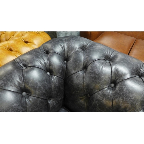 1301 - A 'Historian' Hobnail liquorice distressed leather upholstered Chesterfield style three seater sofa ... 