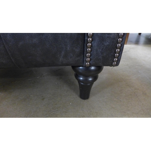 1301 - A 'Historian' Hobnail liquorice distressed leather upholstered Chesterfield style three seater sofa ... 