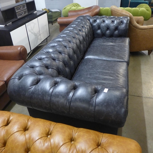 1301 - A 'Historian' Hobnail liquorice distressed leather upholstered Chesterfield style three seater sofa ... 