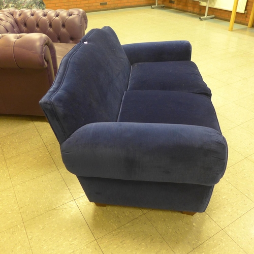 1368 - An Old Lace deep blue velvet upholstered two seater sofa, RRP £1900 * this lot is subject to VAT