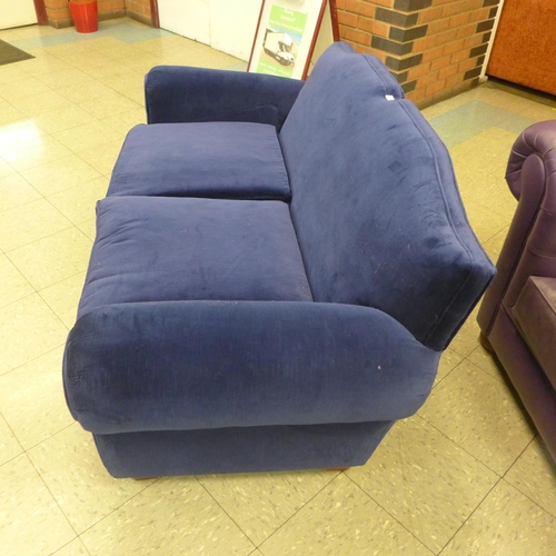 1368 - An Old Lace deep blue velvet upholstered two seater sofa, RRP £1900 * this lot is subject to VAT