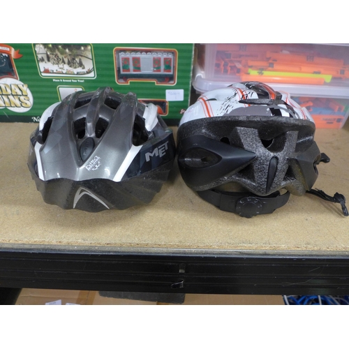 2154 - Two Met bicycle helmets