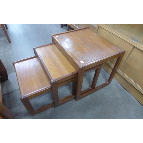 63 - A teak nest of tables