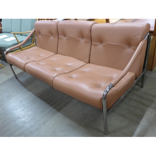 66 - A Pieff chrome and tan leather settee