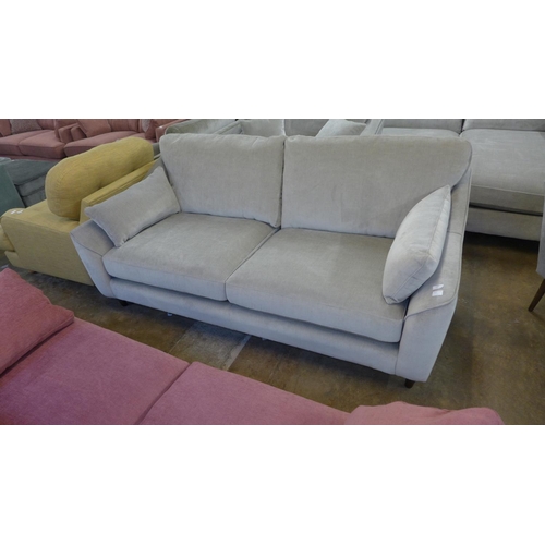 1394 - A Hepburn mist velvet upholstered three seater sofa - RRP £1249