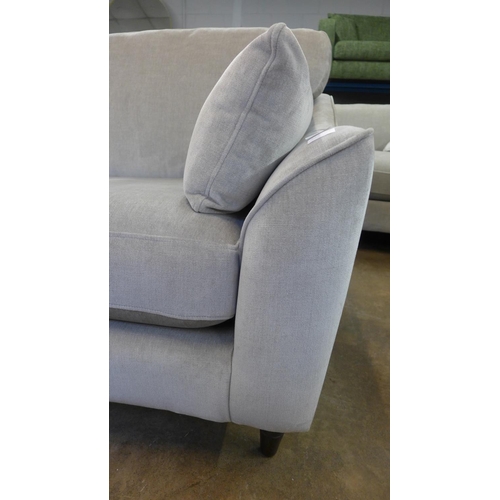 1394 - A Hepburn mist velvet upholstered three seater sofa - RRP £1249