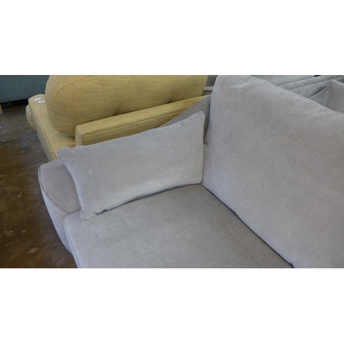 1394 - A Hepburn mist velvet upholstered three seater sofa - RRP £1249