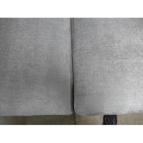 1396 - A silver textured velvet upholstered 2.5 seater sofa