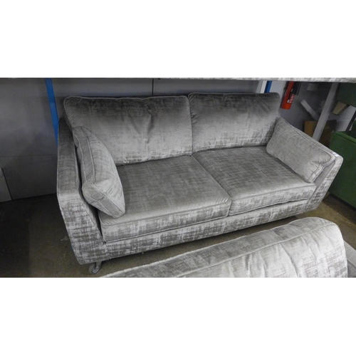 1404 - A Rene Dolce aluminium velvet upholstered three seater sofa - RRP £1499 - missing legs