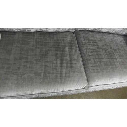 1404 - A Rene Dolce aluminium velvet upholstered three seater sofa - RRP £1499 - missing legs