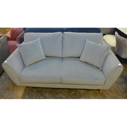 1412 - A grey velvet upholstered 2.5 seater sofa