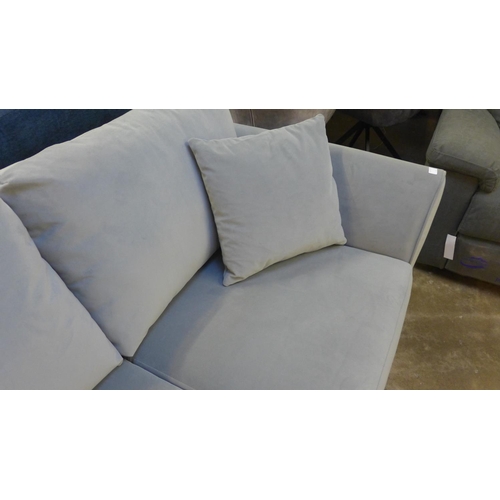 1412 - A grey velvet upholstered 2.5 seater sofa