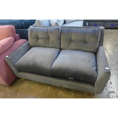 1413 - An Arsenal grey velvet upholstered button backed 2.5 seater sofa - RRP £638