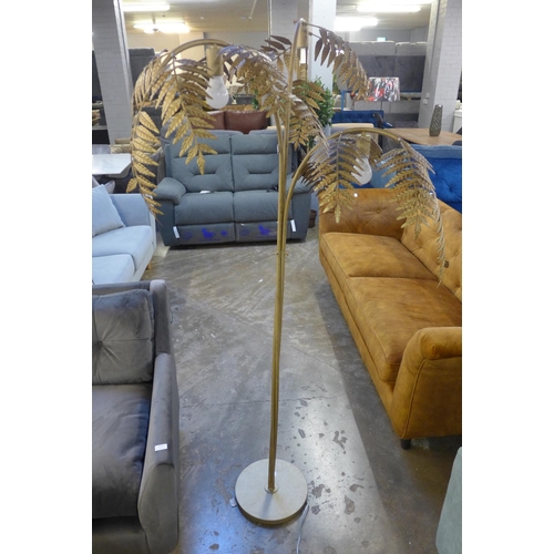 1418 - A gold floor standing fern lamp