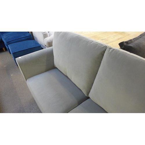 1455 - A grey velvet upholstered 2.5 seater sofa