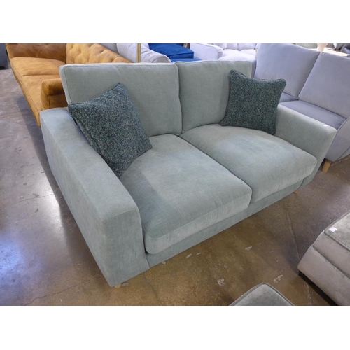 1456 - A sage fabric upholstered 2.5 seater sofa