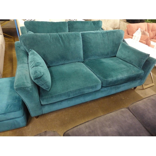 1460 - A Luna teal velvet upholstered three seater sofa on dark turned oak legs