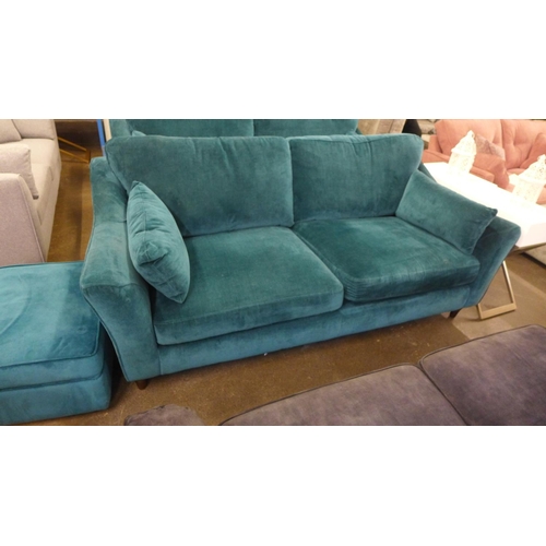 1461 - A Luna teal velvet upholstered three seater sofa on dark turned oak legs