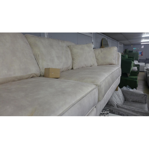 1463 - A Rene sandstone shark skin effect four seater splitter sofa - RRP £1625