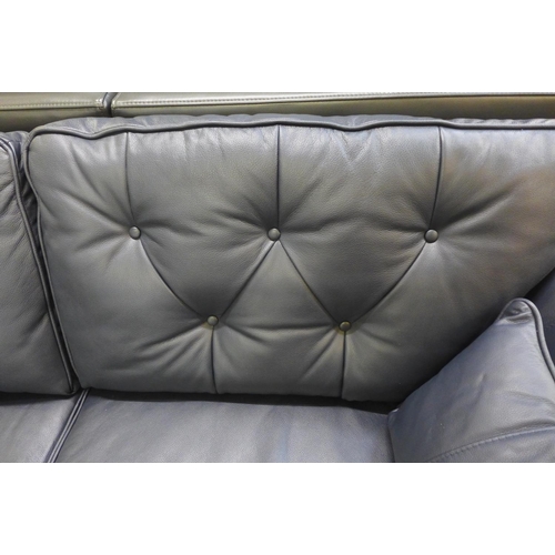 1475 - A Hoxton dark blue leather three seater sofa