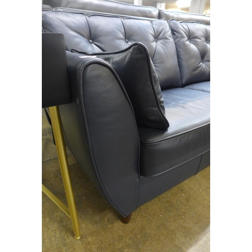 1475 - A Hoxton dark blue leather three seater sofa