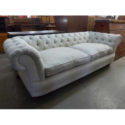 182 - A Victorian style fabric upholstered Chesterfield settee