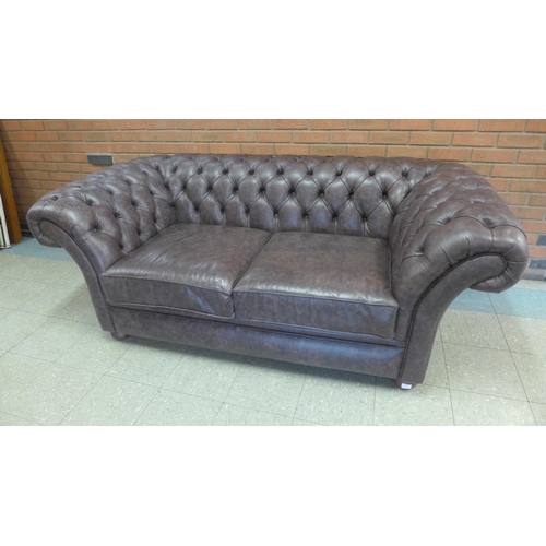 1353 - A Scholar chocolate distressed leather upholstered Chesterfield three seater sofa , RRP £2400 * this... 