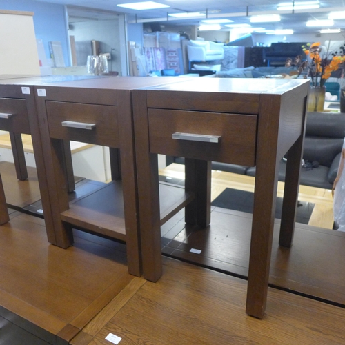 1605 - A pair of dark oak bedside tables * this lot is subject to VAT