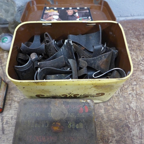 1167 - A box of picture rail hooks, Brownie, VHS Video Guide to British Birds, etc. **PLEASE NOTE THIS LOT ... 