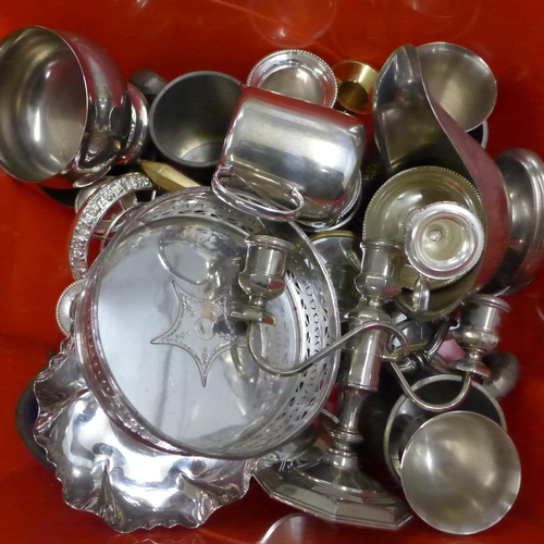 1187 - A box of silver plate and pewter including two trays, salver, cased forks, wine coaster, etc., and a... 