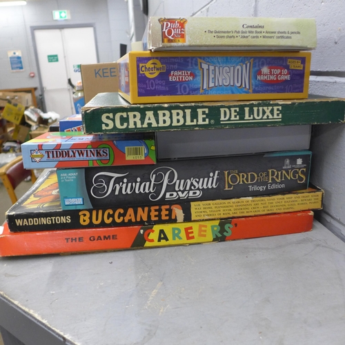 1193 - A collection of vintage and modern board games, including Scrabble De Luxe, Buccaneer, Careers, some... 