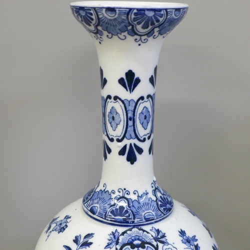 604 - A Delft vase, a blue and white oriental vase and two other items