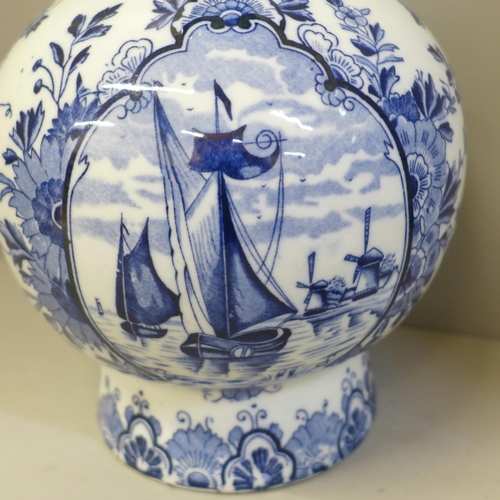 604 - A Delft vase, a blue and white oriental vase and two other items