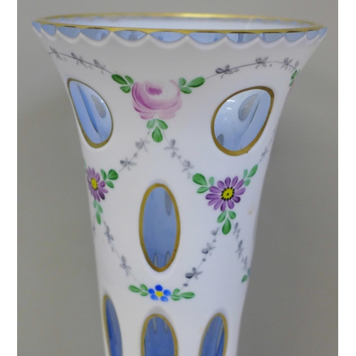 607 - A Bohemian overlay opaline glass vase, 20cm