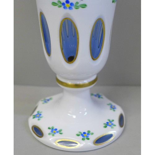 607 - A Bohemian overlay opaline glass vase, 20cm