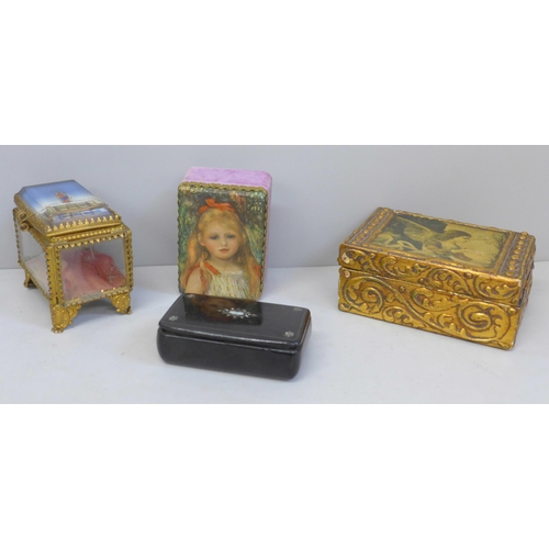 633 - A papier mache snuff box set with abalone, a small gilt metal jewellery casket and two other boxes