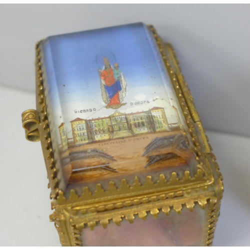 633 - A papier mache snuff box set with abalone, a small gilt metal jewellery casket and two other boxes