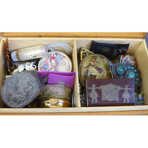 652 - Two boxes of trinket boxes, badges, jewellery, etc.