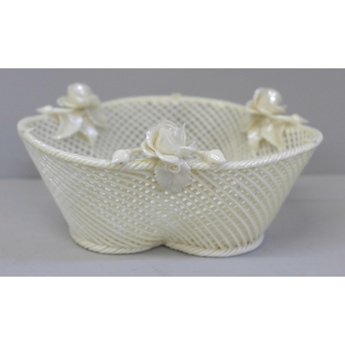 654 - An early Belleek Creamware lattice basket, 14cm