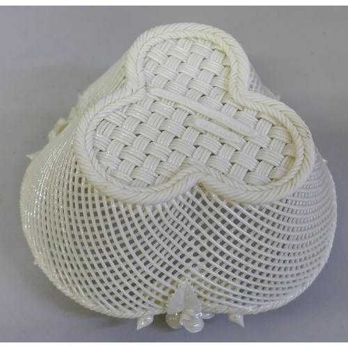 654 - An early Belleek Creamware lattice basket, 14cm