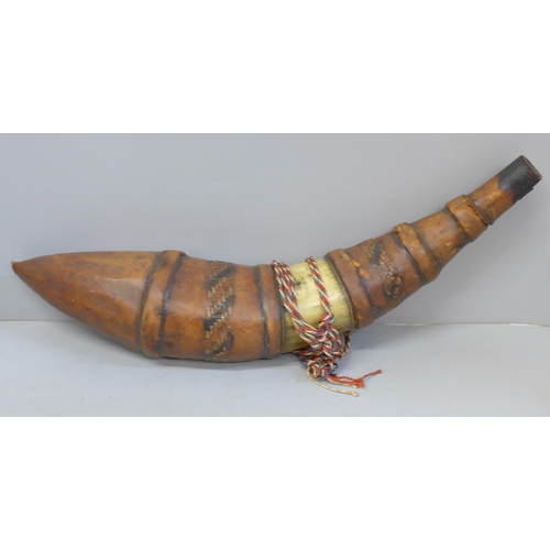 658 - A Dahomey Amazons women warrior horn and leather powder flask, mid/late 1800s